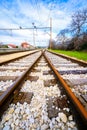 Two empty railway lines joining in the distance Royalty Free Stock Photo