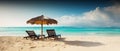 Two empty seats under a palm leaf parasol