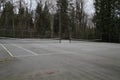 Two empty side by side tennis courts