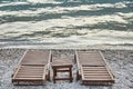 Two empty sunbeds. Beach in Kotor. Bay of Kotor Montenegro.