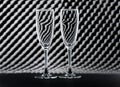 Two empty wine glasses on an abstract background. Royalty Free Stock Photo