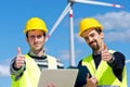 Two Engineers in a Wind Turbine Power Station Royalty Free Stock Photo