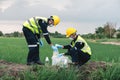 Two Environmental Engineers Take Water Samples at Natural Water Sources Near Farmland Maybe Contaminated by Toxic Waste or Royalty Free Stock Photo