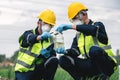 Two Environmental Engineers Take Water Samples at Natural Water Sources Near Farmland Maybe Contaminated by Toxic Waste or Royalty Free Stock Photo