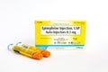 Two epipens lying near box packaging Royalty Free Stock Photo