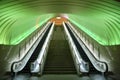 Two Escalators with Green Light overhead