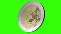 Two Euro coin spinning on its axis on a green background, chromakey video loop without interruption, European money.