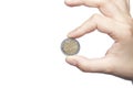 Two euros hold in the fingers, white background, copy space