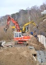 Two excavators work at soil movement