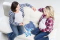 Two expectant mothers checking out children's wear Royalty Free Stock Photo