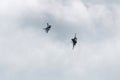 Two F16 fighter jet over clouds