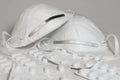 Two face masks and stack of medicine packets isolated on a white background Royalty Free Stock Photo