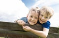 Two faces of a 7 year old boy, brothers. Happy children Royalty Free Stock Photo