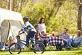 Two Families Enjoying Camping Holiday In Countryside Royalty Free Stock Photo