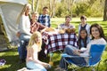 Two Families Enjoying Camping Holiday In Countryside Royalty Free Stock Photo