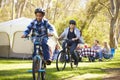 Two Families Enjoying Camping Holiday In Countryside Royalty Free Stock Photo