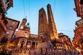 Two famous falling Bologna towers Asinelli and Garisenda. Evening view, long exposure. Bologna, Emilia-Romagna, Italy Royalty Free Stock Photo