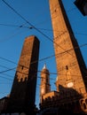 Two famous falling Bologna towers Asinelli and Garisenda in sunset