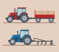 Two farm tractors isolated on beige background.