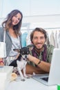 Two fashion designers smiling to the camera Royalty Free Stock Photo