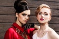 Two fashion models posing Royalty Free Stock Photo