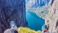 Norway - hiking boots with the view on the fjord