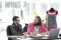 Two fellow designers sitting at a Desk in the Studio Royalty Free Stock Photo