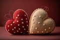 Two felted cute beige and red pastel romantic hearts on a deep red background with copy space, Vintage valentine\'s day or