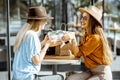 Girlfriends on the cafe terrace Royalty Free Stock Photo