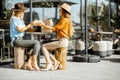 Girlfriends on the cafe terrace Royalty Free Stock Photo