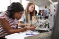Two Female College Students Building Machine In Science Robotics Or Engineering Class Royalty Free Stock Photo