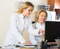 Two female doctors working together Royalty Free Stock Photo