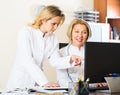 Two female doctors working together Royalty Free Stock Photo