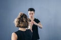 Two female fighter of martial arts practice in gym. Taekwondo coach and student in personal training. Self-defense class for women Royalty Free Stock Photo