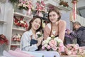 Two female florist entrepreneurs arranged bunch of blossoms in flower shop. Royalty Free Stock Photo