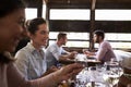 Two female friends at a girlsÃ¯Â¿Â½ lunch in a busy restaurant Royalty Free Stock Photo