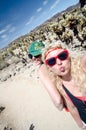 Two female friends take a selfie at the Cholla Cactus Garden in Joshua Tree National Park