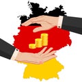 Two female hands around gold euro coins on the background of the map of Germany in the colors of the national flag