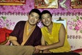 Two female monks smiling