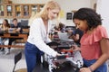 Two Female Pupils Building Robotic Vehicle In Science Lesson Royalty Free Stock Photo