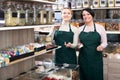 Two female sellers wearing apron Royalty Free Stock Photo