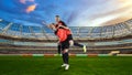 Two female soccer players celebrating victory on soccer filed Royalty Free Stock Photo