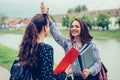 Two female students are giving high five after successfully learning Royalty Free Stock Photo