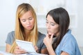 two female students studying together at home Royalty Free Stock Photo
