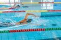 Two female swimmers during a race in the freestyle swim discipline Royalty Free Stock Photo