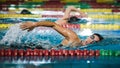 Two female swimmers during a race in the freestyle swim discipline Royalty Free Stock Photo