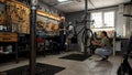 Two female technicians fixing wheels on bicycle