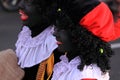 Two female zwarte pieten Royalty Free Stock Photo