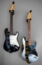 Two Fender electric guitars.