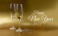 Happy New Year 2022 shiny golden background with glass of champagne stock images Royalty Free Stock Photo
